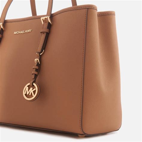 michael kors jet set ns tote|Michael Kors jet set luggage.